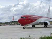 Bersejarah! Jokowi Mendarat dengan Boeing Business Jet 737-800 di IKN