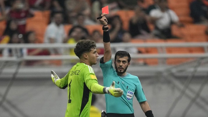 Wasit Omar Al Ali. (AP Photo/Achmad Ibrahim)