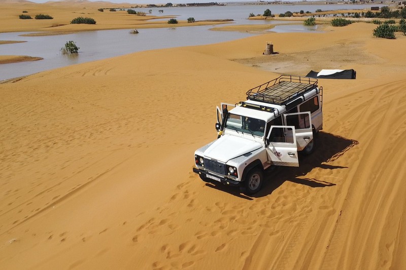 Sebuah Oasis tercermin di sebuah danau yang disebabkan oleh hujan lebat di kota gurun Merzouga, dekat Rachidia, tenggara Maroko, Rabu, 2 Oktober 2024. Sebuah Oasis tercermin di sebuah danau yang disebabkan oleh hujan lebat di kota gurun Merzouga, dekat Rachidia, tenggara Maroko, Rabu, 2 Oktober 2024. (AP Photo)