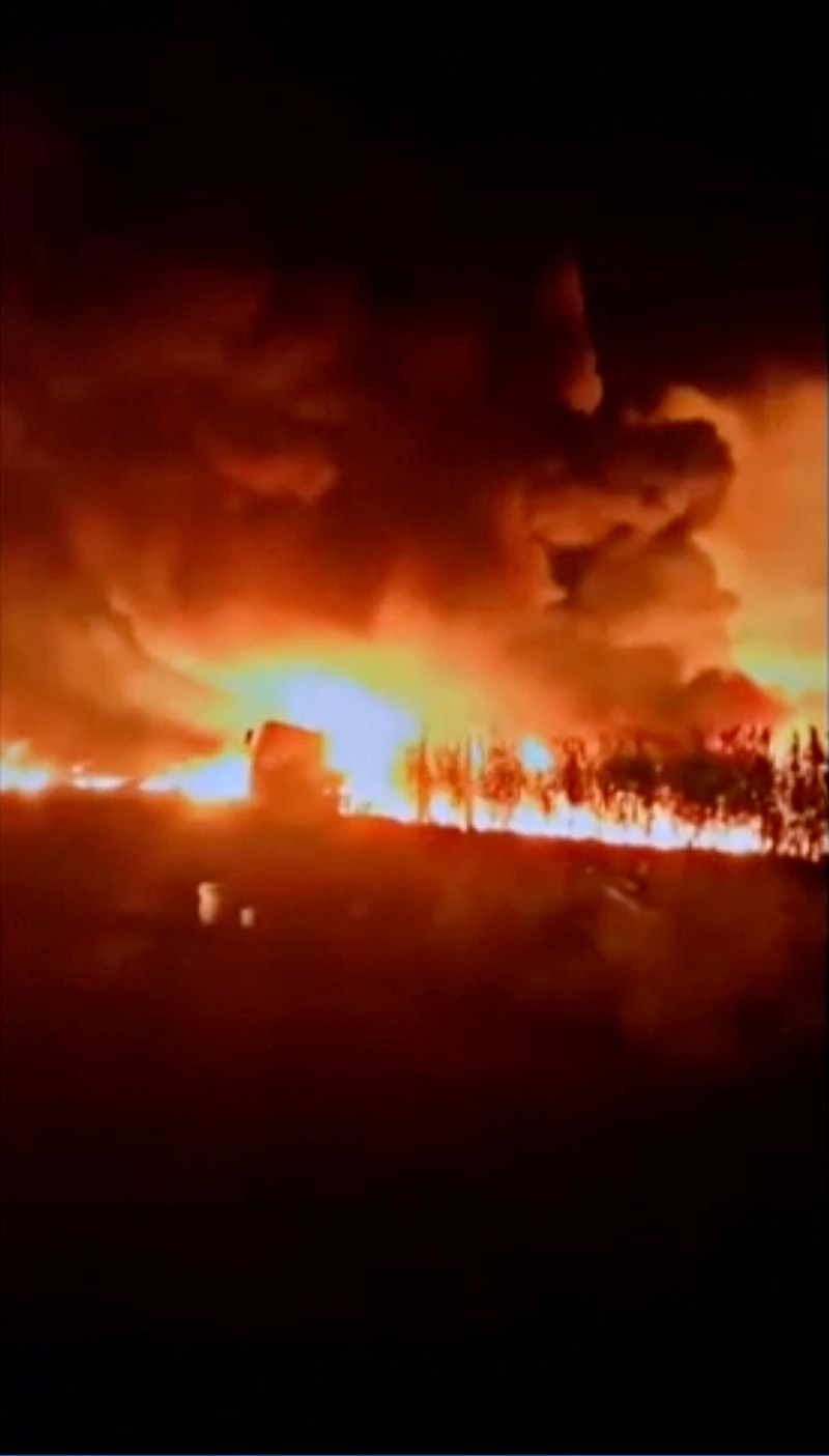 NIGERIA-BLAST/ Smoke plumes rise from a large fire after a fuel tanker crashed and exploded, in Majia, Jigawa State, Nigeria, in this screengrab obtained from a social media video released on October 16, 2024. Social Media/via REUTERS THIS IMAGE HAS BEEN SUPPLIED BY A THIRD PARTY. MANDATORY CREDIT. NO RESALES. NO ARCHIVES.