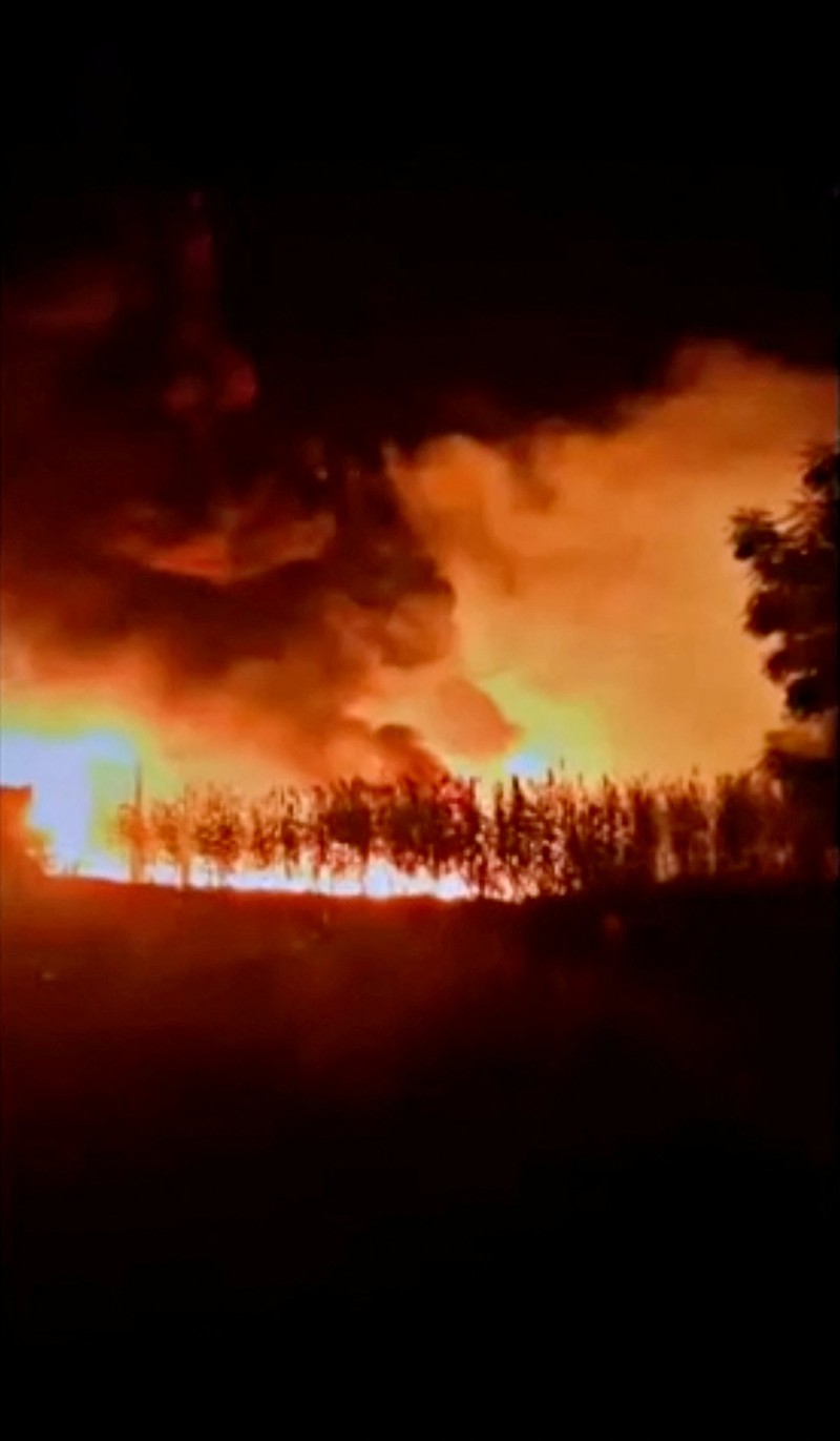 NIGERIA-BLAST/ Smoke plumes rise from a large fire after a fuel tanker crashed and exploded, in Majia, Jigawa State, Nigeria, in this screengrab obtained from a social media video released on October 16, 2024. Social Media/via REUTERS THIS IMAGE HAS BEEN SUPPLIED BY A THIRD PARTY. MANDATORY CREDIT. NO RESALES. NO ARCHIVES.