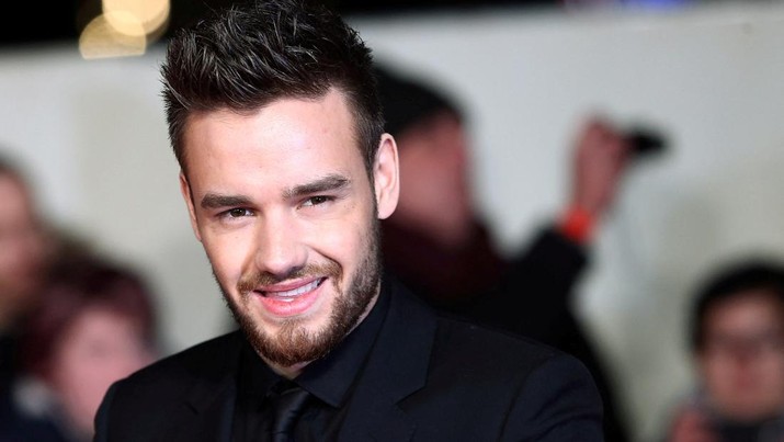 FILE PHOTO: Singer Liam Payne poses for photographers at the world premiere of the film 