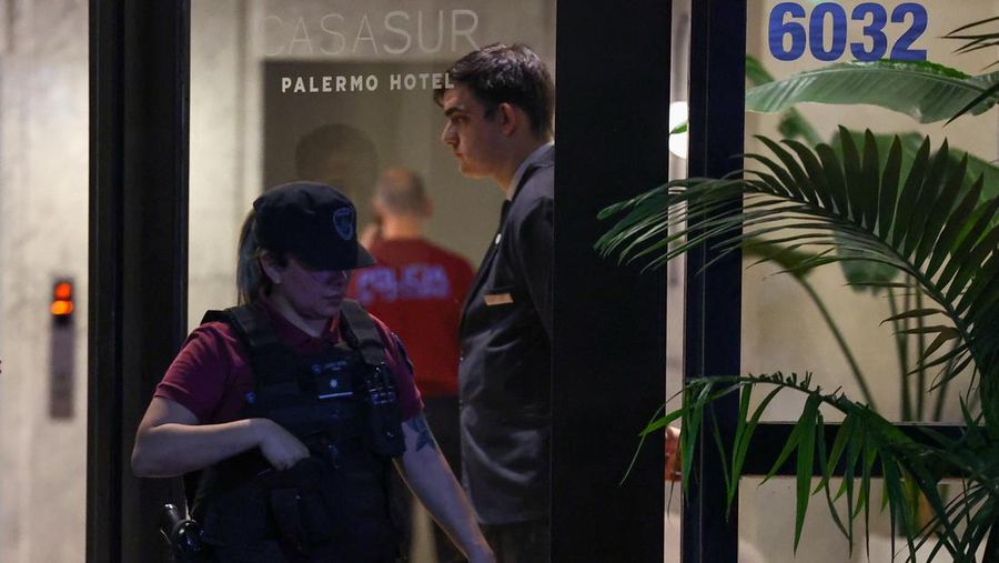 First responders work outside the hotel where Liam Payne, former One Direction member, was found dead, in Buenos Aires, Argentina, October 16, 2024. REUTERS/Agustin Marcarian