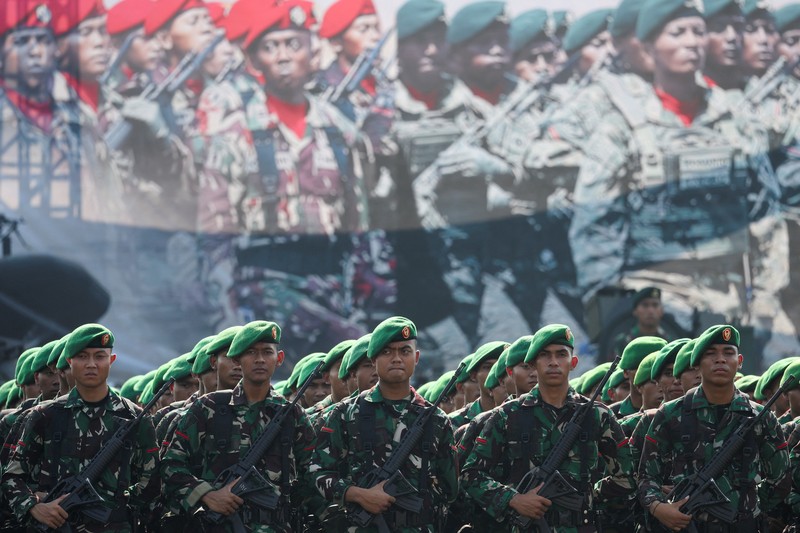 INDONESIA-POLITICS/INAUGURATION An Indonesian Army personnel reacts as he attends a security preparation before the inauguration of President-elect Prabowo Subianto and Vice President-elect Gibran Rakabuming Raka at the National Monument (Monas) in Jakarta, Indonesia, October 18, 2024. REUTERS/Ajeng Dinar Ulfiana TPX IMAGES OF THE DAY