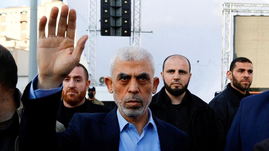FILE PHOTO: Yahya Sinwar, Gaza Strip chief of the Palestinian Islamist Hamas movement, waves to Palestinians during a rally to mark the annual al-Quds Day (Jerusalem Day), in Gaza, April 14, 2023. REUTERS/Ibraheem Abu Mustafa/File Photo