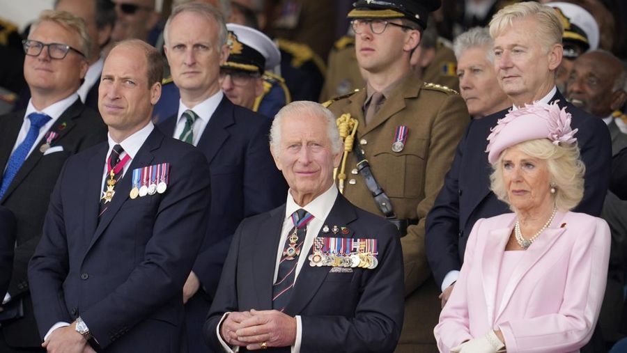 Britain's Prince William, from left, Britain's King Charles III and Queen Camilla attend a D-Day national commemoration event in Portsmouth, England, Wednesday, June 5, 2024.(AP Photo/Kin Cheung, Pool)