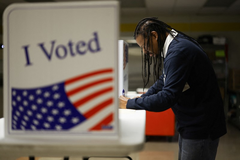 A man votes in the 2024 U.S. presidential election on Election Day, at Pittsburgh Manchester School in Pittsburgh, Pennsylvania, U.S., November 5, 2024. REUTERS/Quinn Glabicki