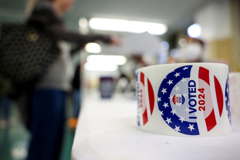 A man votes in the 2024 U.S. presidential election on Election Day, at Pittsburgh Manchester School in Pittsburgh, Pennsylvania, U.S., November 5, 2024. REUTERS/Quinn Glabicki