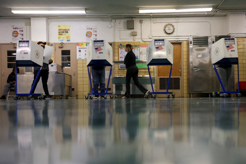 A man votes in the 2024 U.S. presidential election on Election Day, at Pittsburgh Manchester School in Pittsburgh, Pennsylvania, U.S., November 5, 2024. REUTERS/Quinn Glabicki