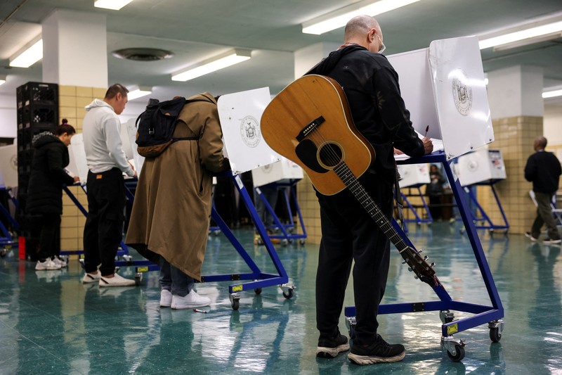 A man votes in the 2024 U.S. presidential election on Election Day, at Pittsburgh Manchester School in Pittsburgh, Pennsylvania, U.S., November 5, 2024. REUTERS/Quinn Glabicki