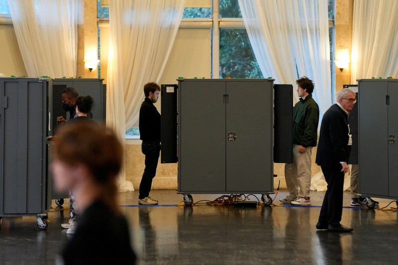 A man votes in the 2024 U.S. presidential election on Election Day, at Pittsburgh Manchester School in Pittsburgh, Pennsylvania, U.S., November 5, 2024. REUTERS/Quinn Glabicki