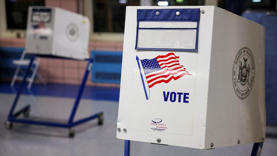 A view shows voting booths at PS 20 Anna Silver Elementary School, on Election Day for the 2024 U.S. presidential election in Manhattan, New York City, U.S., November 5, 2024. REUTERS/Andrew Kelly