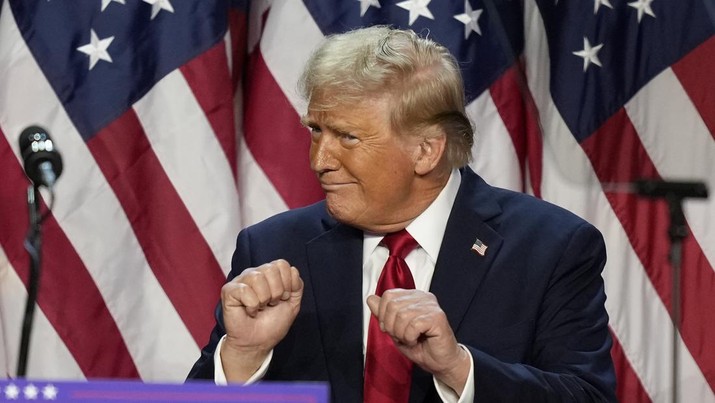 Republican presidential nominee former President Donald Trump dances after speaking at an election night watch party, Wednesday, Nov. 6, 2024, in West Palm Beach, Fla. (AP Photo/Alex Brandon)