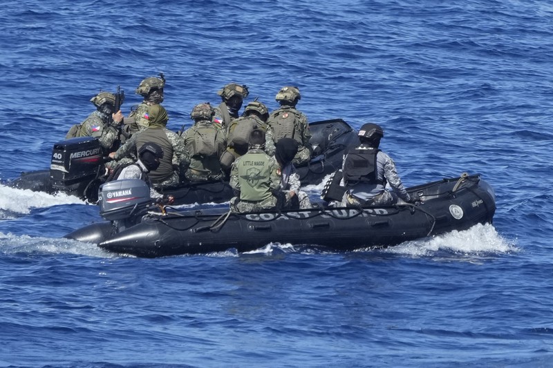 Philippines South China Sea Philippine Navy Fast Attack Interdiction Craft Lolinato To-Ong passes by a Chinese Navy ship during a Philippine military multi-service joint exercise on Wednesday Nov. 6, 2024 at Loaita island locally called Kota island at the disputed South China Sea, Philippines. (AP Photo/Aaron Favila)