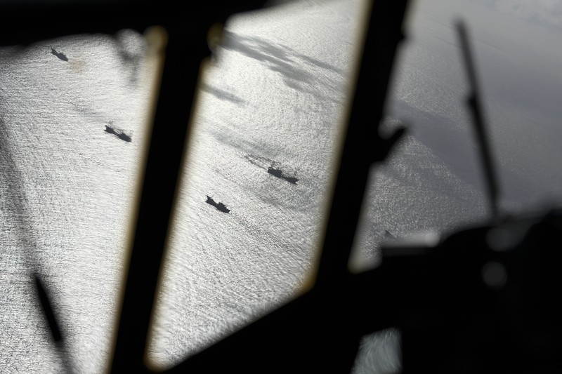 Philippines South China Sea Philippine Navy Fast Attack Interdiction Craft Lolinato To-Ong passes by a Chinese Navy ship during a Philippine military multi-service joint exercise on Wednesday Nov. 6, 2024 at Loaita island locally called Kota island at the disputed South China Sea, Philippines. (AP Photo/Aaron Favila)