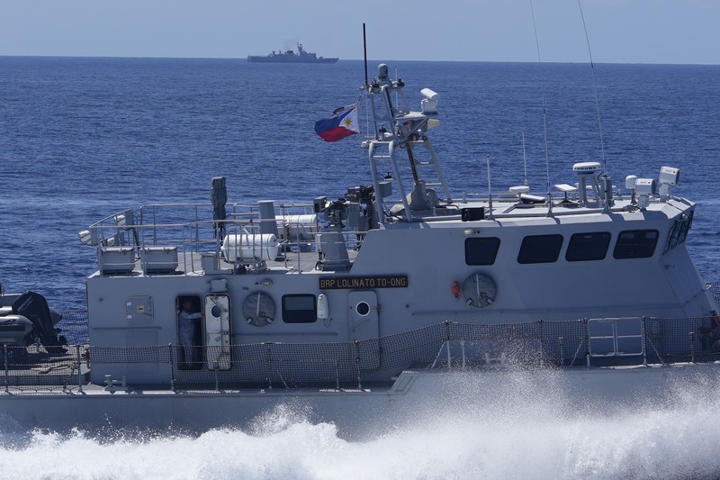 Philippines South China Sea Philippine Navy Fast Attack Interdiction Craft Lolinato To-Ong passes by a Chinese Navy ship during a Philippine military multi-service joint exercise on Wednesday Nov. 6, 2024 at Loaita island locally called Kota island at the disputed South China Sea, Philippines. (AP Photo/Aaron Favila)