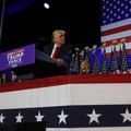 Republican presidential nominee and former U.S. President Donald Trump takes the stage with his wife Melania and son Barron to address supporters at his rally, at the Palm Beach County Convention Center in West Palm Beach, Florida, U.S., November 6,