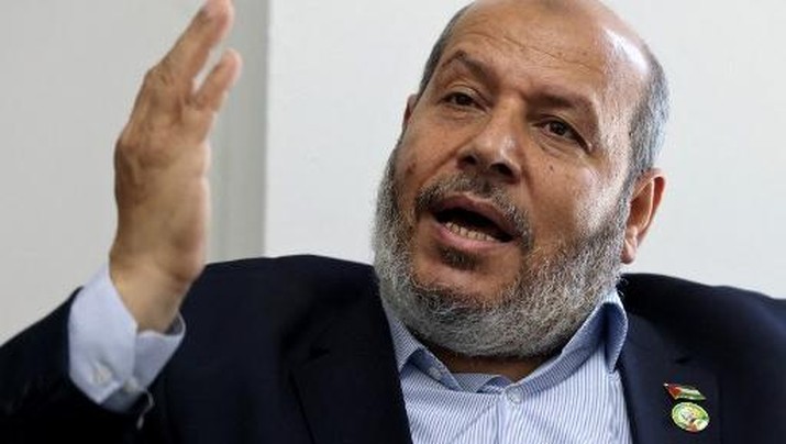 Khalil al-Hayya, senior leader and top Hamas legislative candidate, gestures duringan interview with AFP at his office in Gaza City on April 21, 2021. Postponing elections 