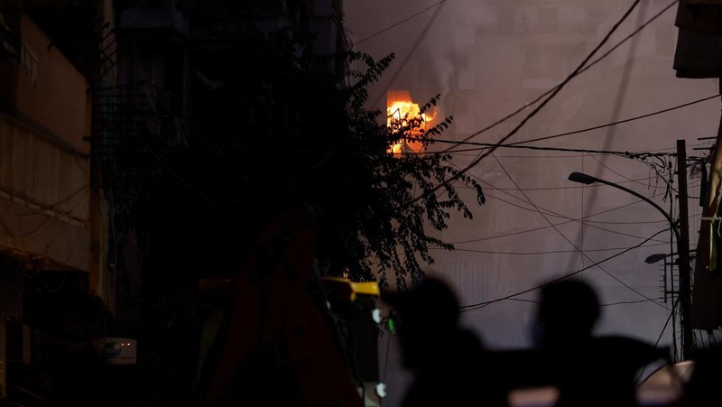 Flames rise from a fire in a balcony following an Israeli strike in Beirut's Basta neighbourhood, amid the ongoing hostilities between Hezbollah and Israeli forces, Lebanon November 23, 2024. REUTERS/Adnan Abidi