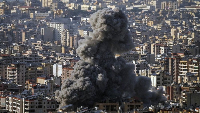 Smoke rises after an Israeli airstrike on Dahiyeh, in the southern suburb of Beirut, Lebanon, Saturday, Nov. 23, 2024. (AP Photo/Hassan Ammar)