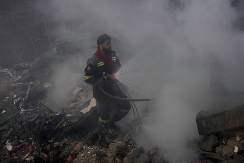Smoke rises after an Israeli airstrike on Dahiyeh, in the southern suburb of Beirut, Lebanon, Saturday, Nov. 23, 2024. (AP Photo/Hassan Ammar)