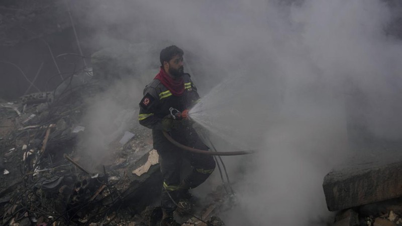 Smoke rises after an Israeli airstrike on Dahiyeh, in the southern suburb of Beirut, Lebanon, Saturday, Nov. 23, 2024. (AP Photo/Hassan Ammar)