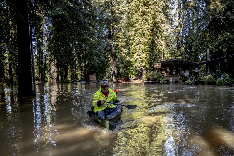 A car is seen submerged in flooded water at Mirabel RV Park & Campground after severe weather in Forestville, Calif., Saturday, Nov. 23, 2024. (Stephen Lam/San Francisco Chronicle via AP)