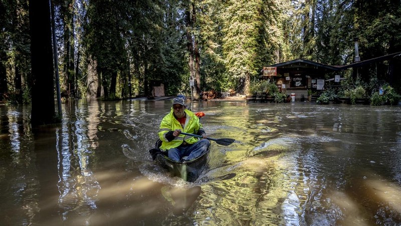 A car is seen submerged in flooded water at Mirabel RV Park & Campground after severe weather in Forestville, Calif., Saturday, Nov. 23, 2024. (Stephen Lam/San Francisco Chronicle via AP)