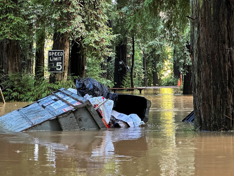 A car is seen submerged in flooded water at Mirabel RV Park & Campground after severe weather in Forestville, Calif., Saturday, Nov. 23, 2024. (Stephen Lam/San Francisco Chronicle via AP)