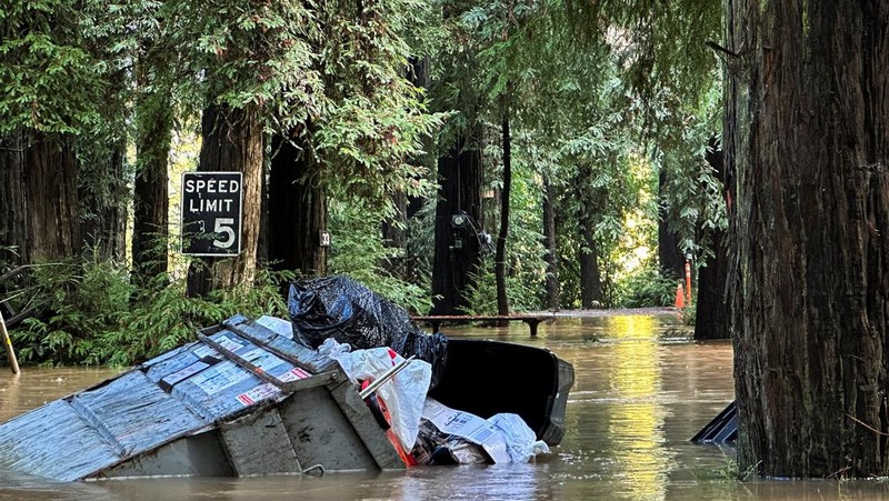 A car is seen submerged in flooded water at Mirabel RV Park & Campground after severe weather in Forestville, Calif., Saturday, Nov. 23, 2024. (Stephen Lam/San Francisco Chronicle via AP)