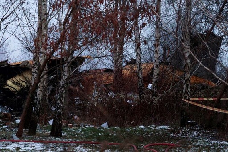 Smoke billows following a DHL cargo plane crash in Vilnius, Lithuania, November 25, 2024. REUTERS/Andrius Sytas