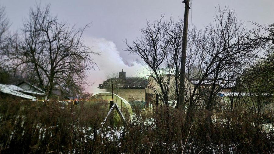 Smoke billows following a DHL cargo plane crash in Vilnius, Lithuania, November 25, 2024. REUTERS/Andrius Sytas