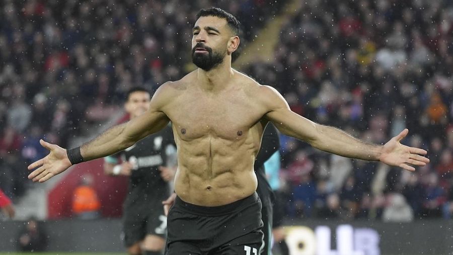 Liverpool's Mohamed Salah celebrates after scoring during the English Premier League soccer match between Southampton and Liverpool in Southampton, England, Sunday, Nov. 24, 2024. (AP Photo/Sean Ryan)