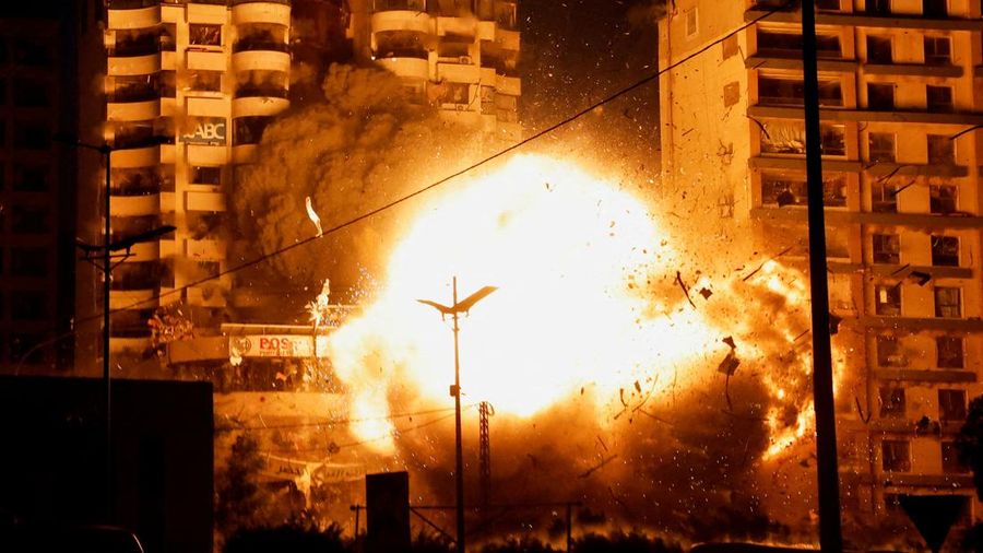 A view shows the moment of an Israeli strike on a building, amid the ongoing hostilities between Hezbollah and Israeli forces, in the Chiyah district of Beirut's southern suburbs, Lebanon, November 25, 2024. REUTERS/Adnan Abidi     TPX IMAGES OF THE DAY