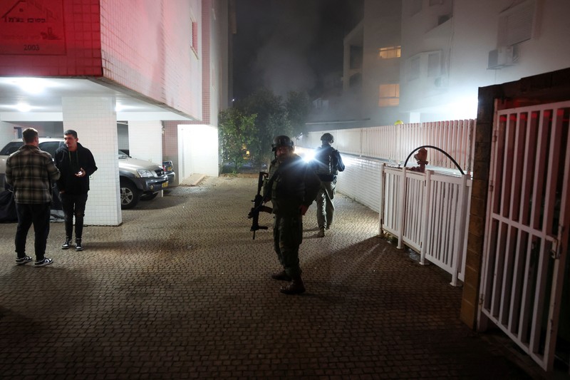 ISRAEL-PALESTINIANS/LEBANON A view shows the moment of an Israeli strike on a building, amid the ongoing hostilities between Hezbollah and Israeli forces, in the Chiyah district of Beirut's southern suburbs, Lebanon, November 25, 2024. REUTERS/Adnan Abidi TPX IMAGES OF THE DAY