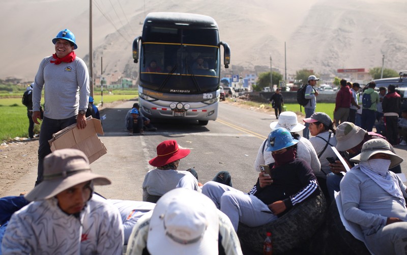 A drone image shows vehicles parked on a mountain road as small-scale miners halt traffic to demand the extension of a program that allows them to operate temporarily, but which authorities say has expanded illegal mining, in Ocona, Peru November 27, 2024. REUTERS/Oswald Charca