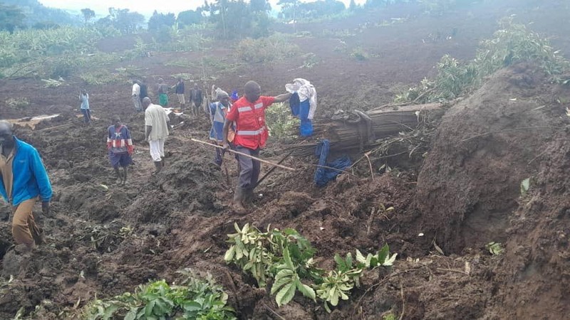 Members of Uganda Red Cross Society (URCS) team work in collaboration with local authorities and community members after a landslide triggered by heavy rains, in Bulambuli District, Uganda, November 28, 2024. Uganda Red Cross Society/Handout via REUTERS    THIS IMAGE HAS BEEN SUPPLIED BY A THIRD PARTY. NO RESALES. NO ARCHIVES