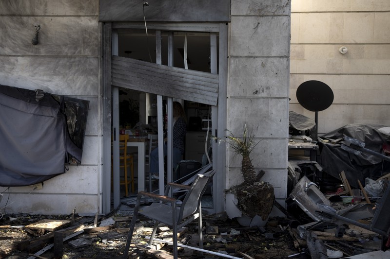 ISRAEL-PALESTINIANS/DRONE-STRIKE A drone view shows Israeli emergency services at the scene of a residential building which Israel's military said had been hit by a UAV that was likely fired from Yemen, in Yavne, Israel, December 9, 2024. REUTERS/Chen Kalifa Levi