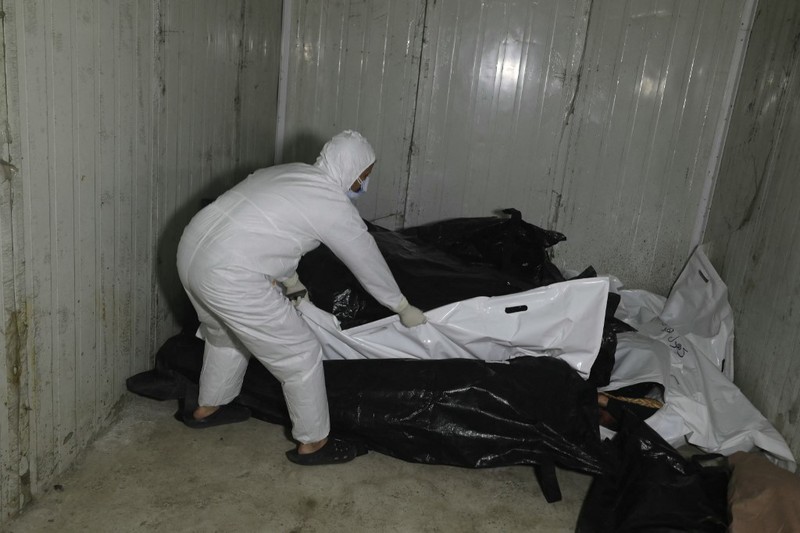Pasukan pemberontak Suriah, yang menggulingkan rezim Presiden Bashar al-Assad, menemukan puluhan mayat dengan tanda-tanda bekas penyiksaan di dalam kamar mayat sebuah rumah sakit dekat ibu kota Damaskus. (Federico PARRA / AFP) Pasukan pemberontak Suriah, yang menggulingkan rezim Presiden Bashar al-Assad, menemukan puluhan mayat dengan tanda-tanda bekas penyiksaan di dalam kamar mayat sebuah rumah sakit dekat ibu kota Damaskus. (Federico PARRA / AFP)