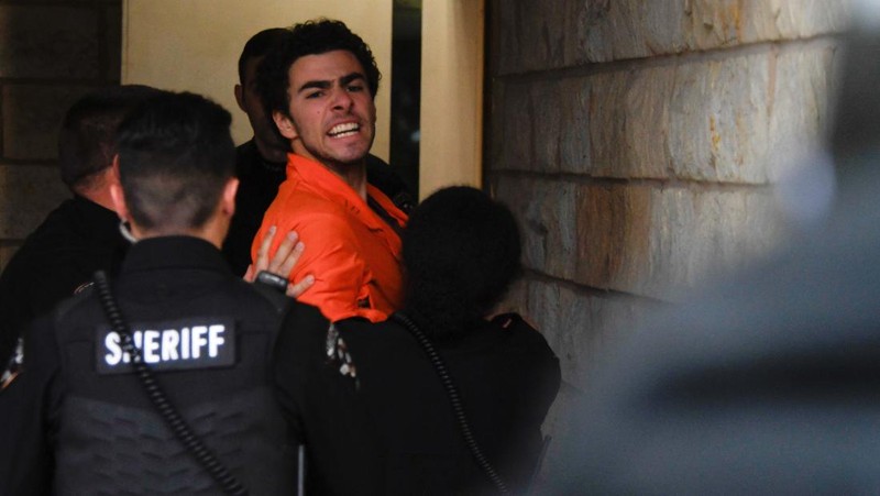 Luigi Mangione, 26, a suspect in the New York City killing of UnitedHealth executive Brian Thompson, arrives for an extradition hearing at Blair County Court House in Hollidaysburg, Pennsylvania, U.S. December 10, 2024.  REUTERS/Matthew Hatcher