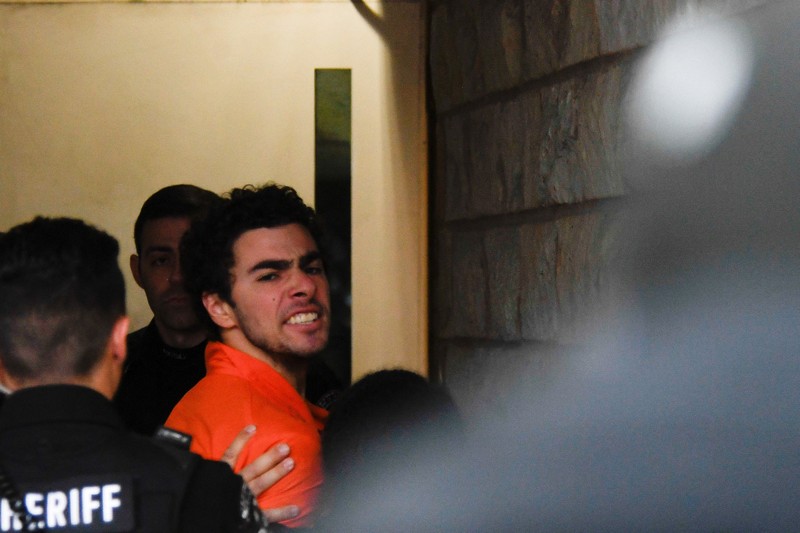 UNITEDHEALTH-CEO/ Luigi Mangione, 26, a suspect in the New York City killing of UnitedHealth executive Brian Thompson, arrives for an extradition hearing at Blair County Court House in Hollidaysburg, Pennsylvania, U.S. December 10, 2024. REUTERS/Matthew Hatcher
