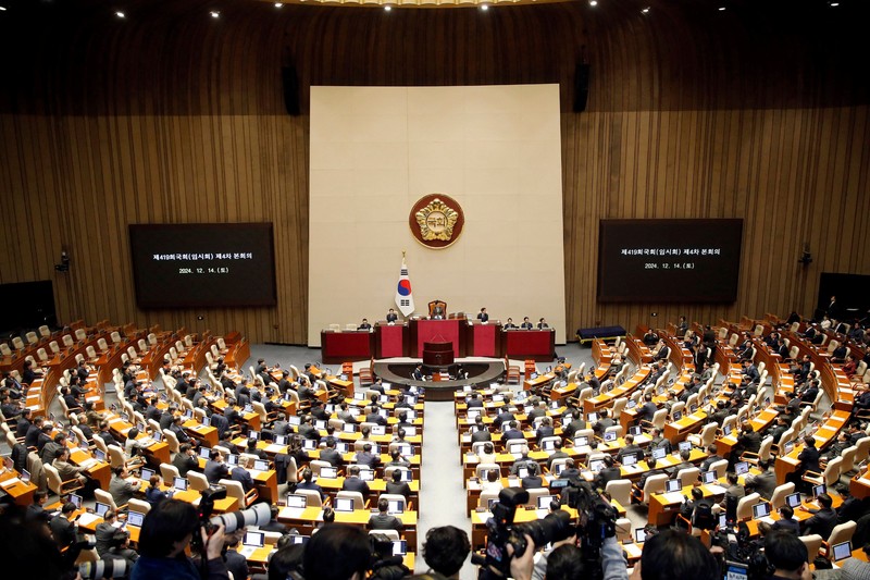 Suasana saat berlangsungnya sesi pleno pemungutan suara pemakzulan Presiden Yoon Suk Yeol di Majelis Nasional di Seoul, Korea Selatan, Sabtu (14/12/2024). (Woohae Cho/Pool via REUTERS) Suasana saat berlangsungnya sesi pleno pemungutan suara pemakzulan Presiden Yoon Suk Yeol di Majelis Nasional di Seoul, Korea Selatan, Sabtu (14/12/2024). (Woohae Cho/Pool via REUTERS)