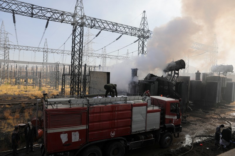 ISRAEL-PALESTINIANS/YEMEN-STRIKES Smoke and flames rise from the premises of the Hezyaz Central generating station in Sanaa Governorate, Yemen in this screengrab obtained from social media video released December 19, 2024. Social Media/via REUTERS THIS IMAGE HAS BEEN SUPPLIED BY A THIRD PARTY. NO RESALES. NO ARCHIVES.