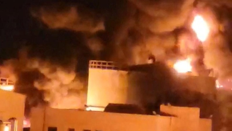 Smoke and flames rise from the premises of the Hezyaz Central generating station in Sanaa Governorate, Yemen in this screengrab obtained from social media video released December 19, 2024. Social Media/via REUTERS  THIS IMAGE HAS BEEN SUPPLIED BY A THIRD PARTY. NO RESALES. NO ARCHIVES.