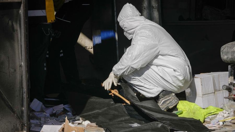 A Syrian civil defense team, known as the White Helmets, inspects a morgue, previously used by pro-government Iranian units, located near the Set Zainab shrine, south of Damascus, Syria, on Wednesday, Dec. 18, 2024 (AP Photo/Hussein Malla)