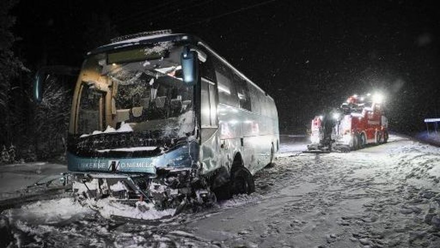 A crashed bus is pictured after a tourist bus and a passenger van collided in Rovaniemi, Lapland, Finland, on December 19, 2024. Two people were killed and several injured when a bus and a minivan carrying tourists mainly from Singapore and China collided in northern Finland, police said on December 20, 2024. (Photo by Jouni Porsanger / Lehtikuva / AFP) / Finland OUT
