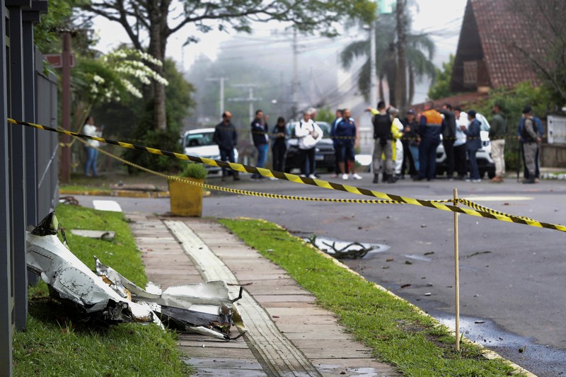 Foto udara meunjukkan lokasi jatuhnya pesawat di pusat Gramado, negara bagian Rio Grande do Sul, Brasil, Minggu (22/12/2024). (Mauricio Tonetto/Rio Grande do Sul State Government/Handout via REUTERS) Foto udara meunjukkan lokasi jatuhnya pesawat di pusat Gramado, negara bagian Rio Grande do Sul, Brasil, Minggu (22/12/2024). (Mauricio Tonetto/Rio Grande do Sul State Government/Handout via REUTERS)