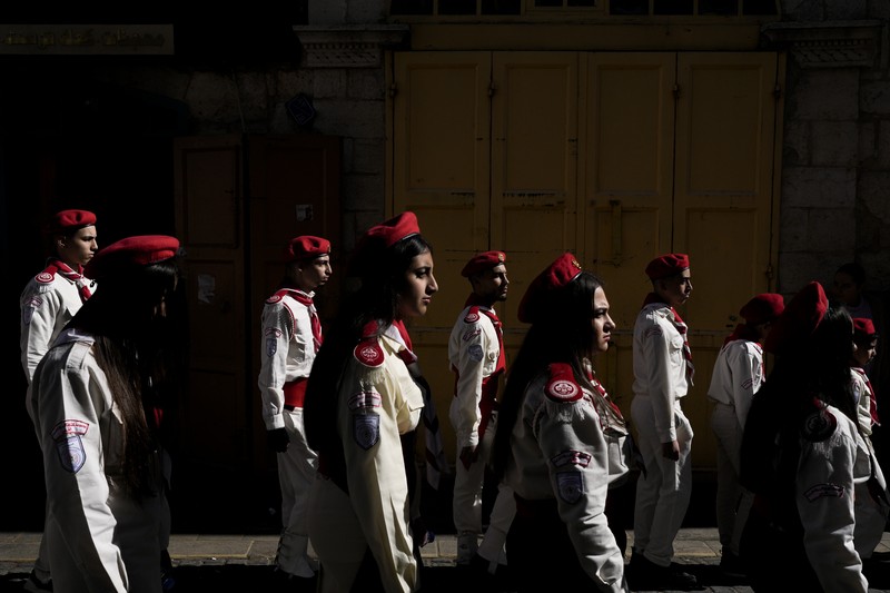 Israel Palestinians Christmas Nuns walk along the Church of the Nativity, traditionally believed to be the birthplace of Jesus, on Christmas Eve, in the West Bank city of Bethlehem, Tuesday, Dec. 24, 2024. (AP Photo/Matias Delacroix)