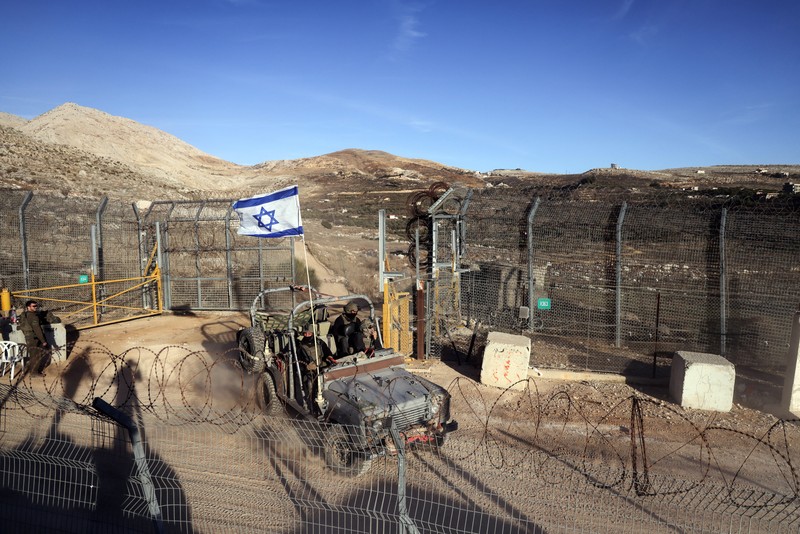 Kepulan asap terlihat usai serangan Israel di dekat bandara Sanaa, Yaman, Kamis (26/12/2024). (AP Photo/Osamah Abdulrahman)