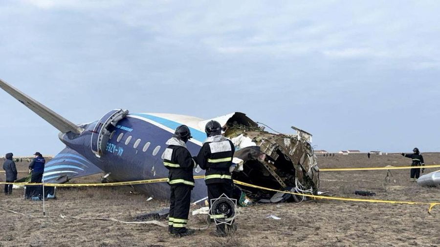 This aerial photo show the burn-out Japan Airlines plane at Haneda airport on Wednesday, Jan. 3, 2024, in Tokyo, Japan. The large passenger plane and a Japanese coast guard aircraft collided on the runway at Tokyo's Haneda Airport on Tuesday and burst into flames, killing several people aboard the coast guard plane, officials said. (Kyodo News via AP)